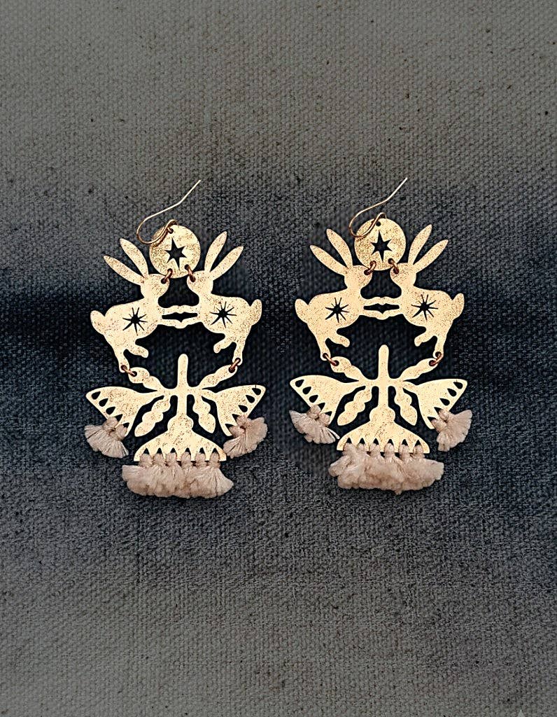 Contemporary handmade brass earrings designed as meaningful