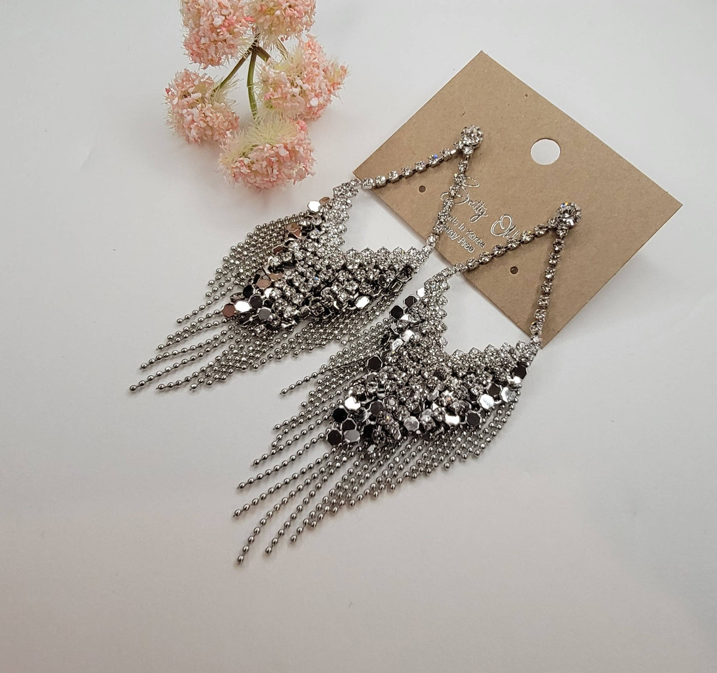 FANCY RHINESTONE DANGLE EARRINGS.