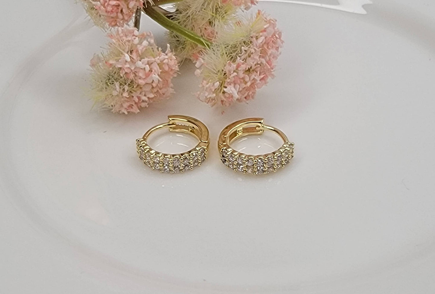 CZ CLICKER EARRINGS.