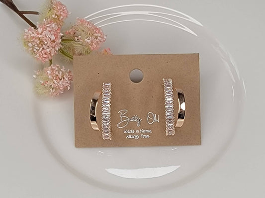 DOUBLE HOOP EARRINGS.