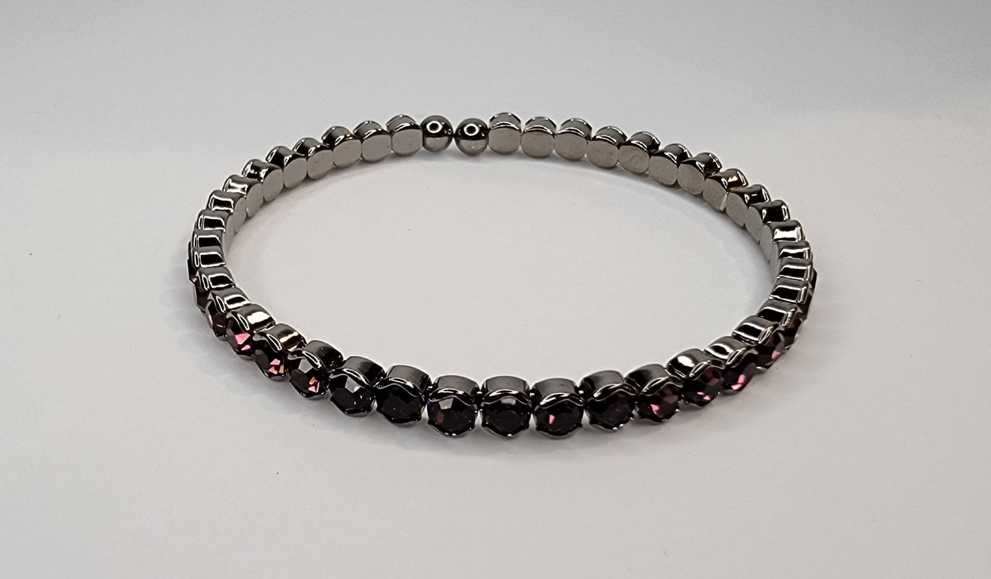 RHINESTONE STACKABLE DARK METAL BRACELET.