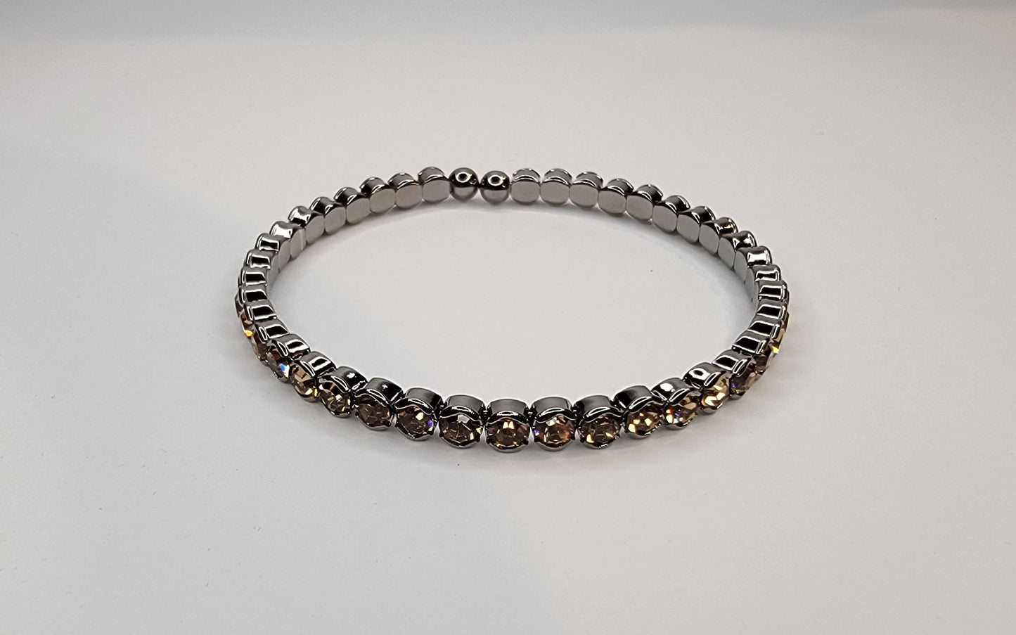 RHINESTONE STACKABLE DARK METAL BRACELET.