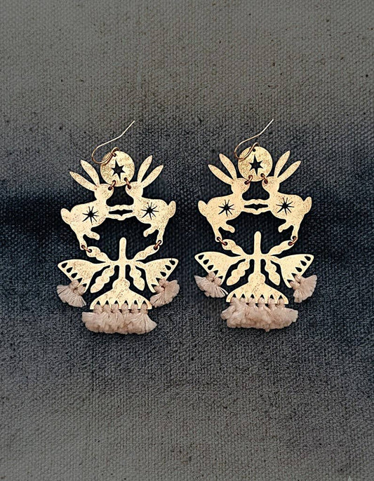 Contemporary handmade brass earrings designed as meaningful
