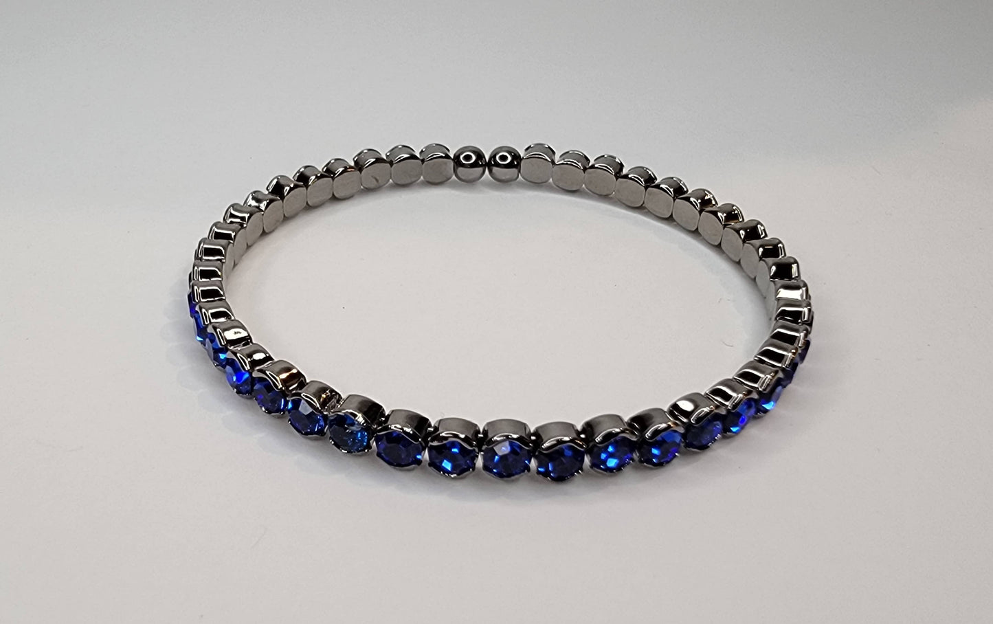RHINESTONE STACKABLE DARK METAL BRACELET.