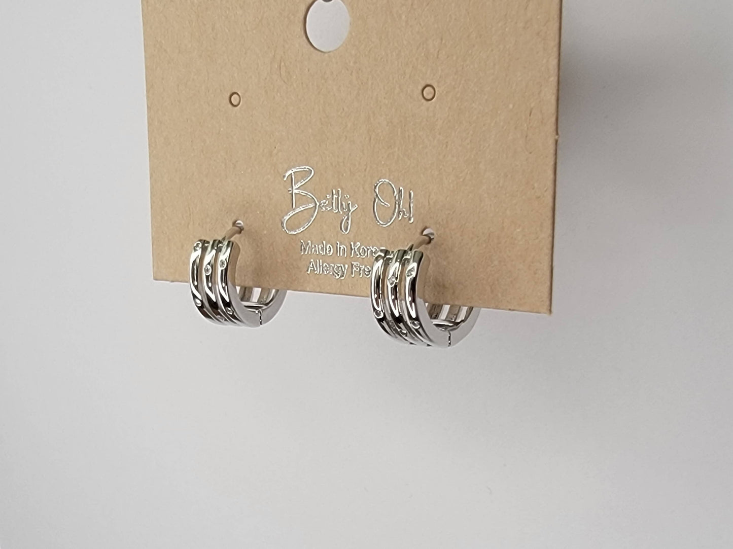 THREE LAYRED WITH RHINESTONE EAR CLICKER EARRINGS.