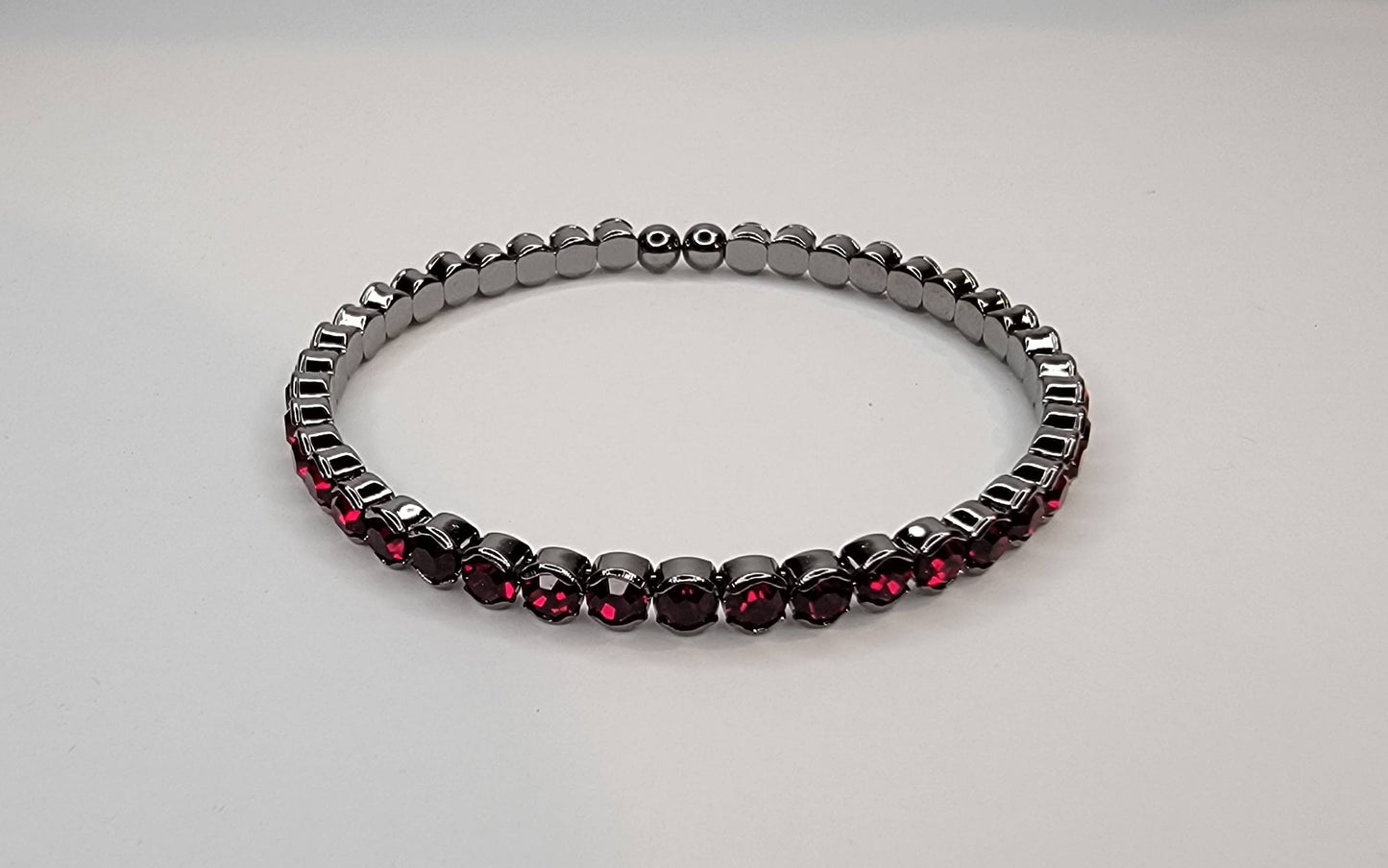 RHINESTONE STACKABLE DARK METAL BRACELET.