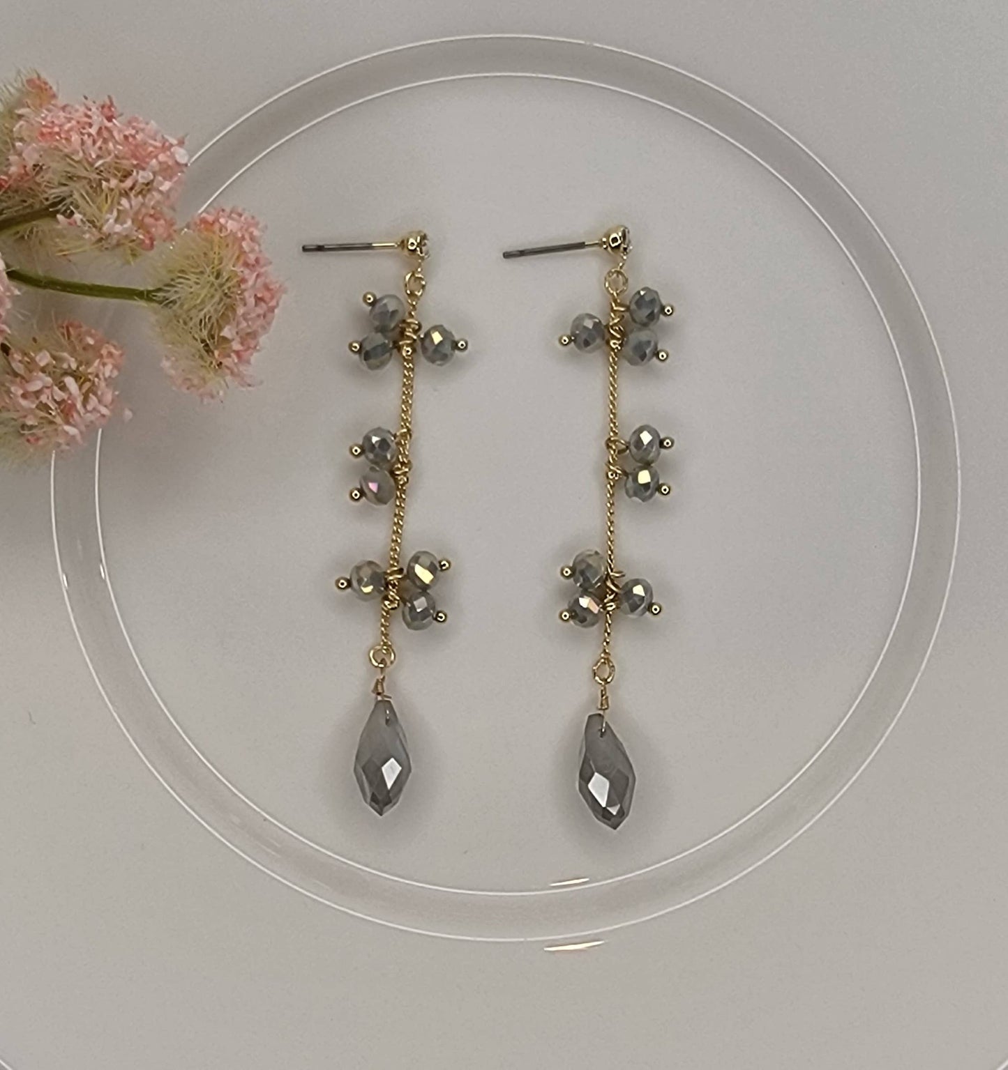 DANGLE EARRINGS.