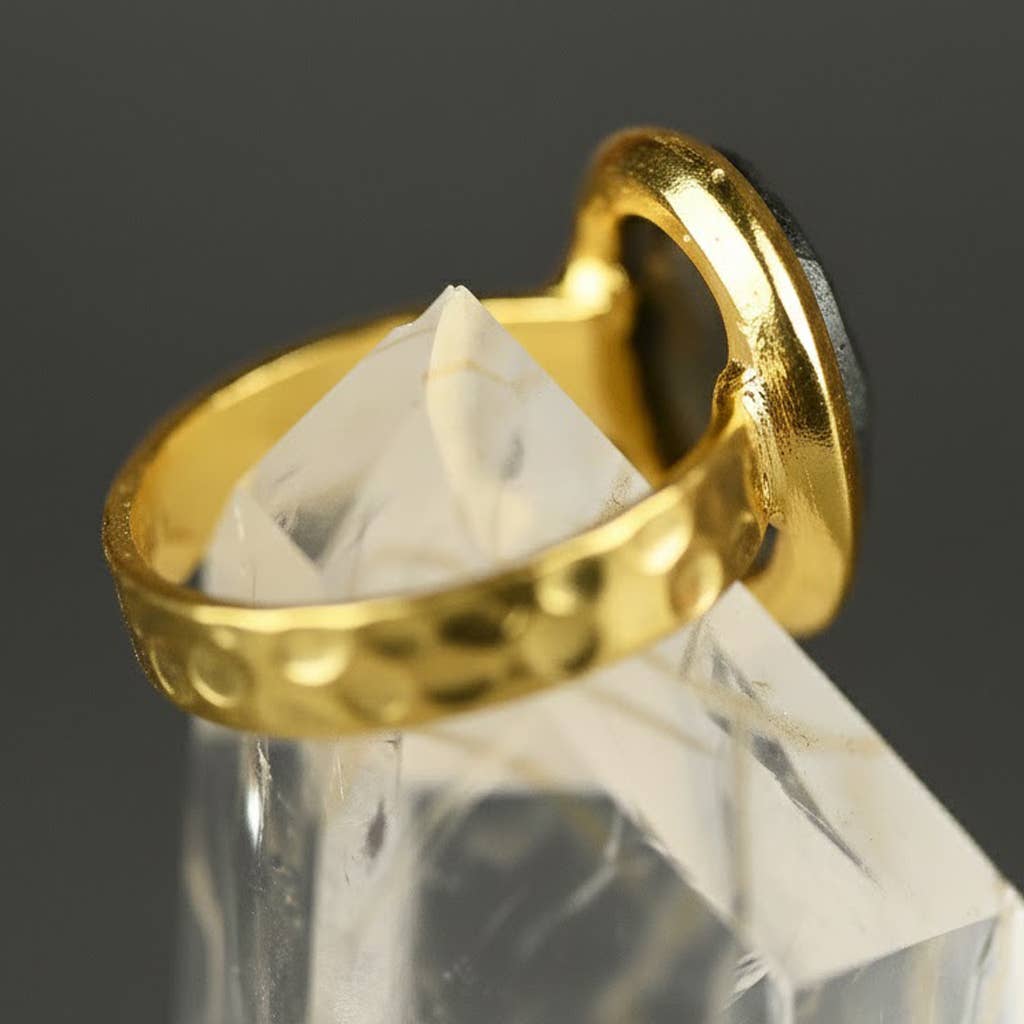 Amethyst Oval Ring on a Hand Hammered Golden Band