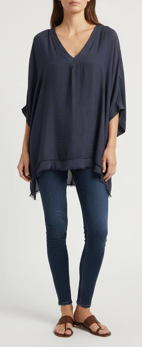 Silk Vneck Ruffle Top
No Tariffs Will Be Added