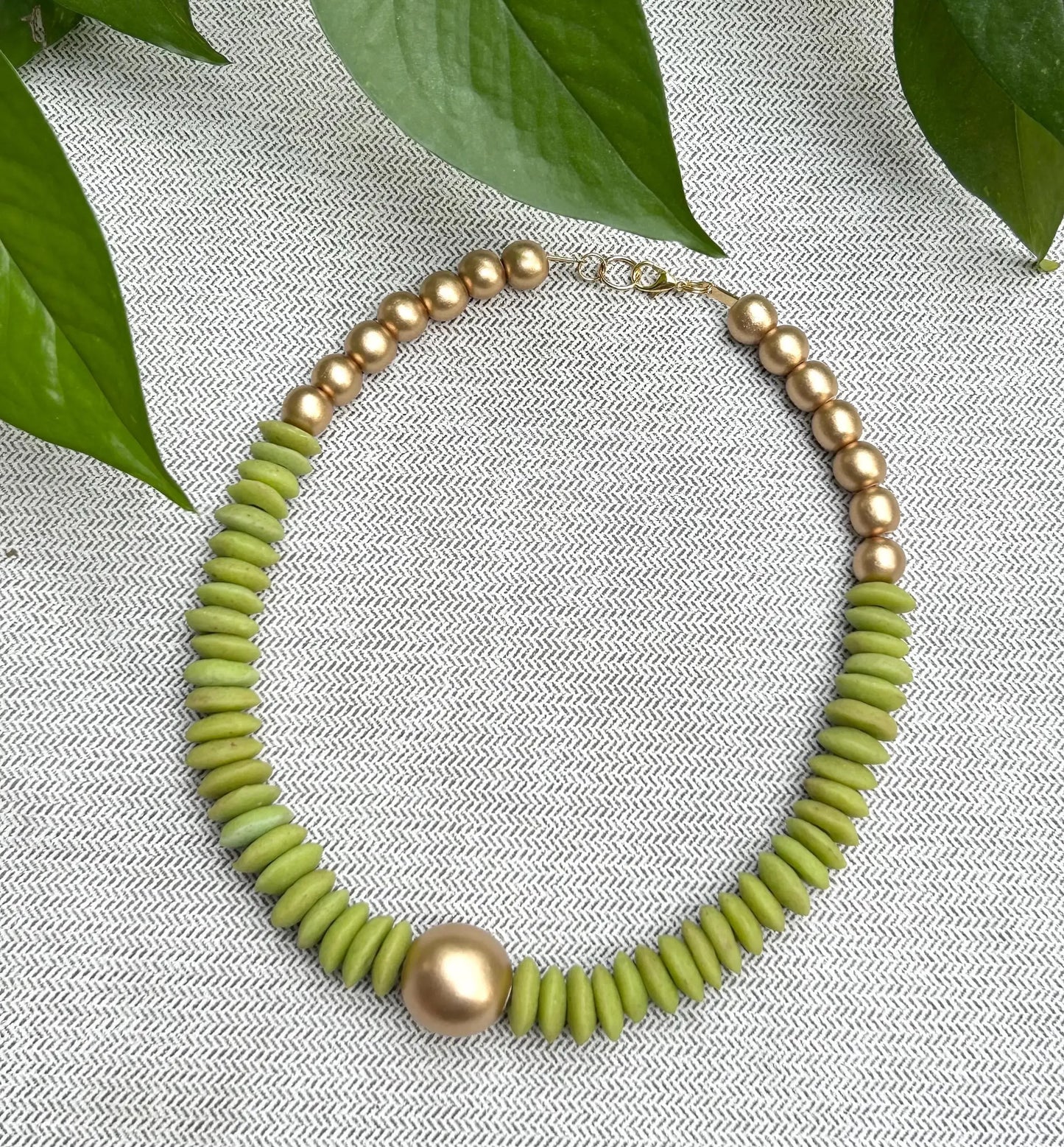 Lime green and gold beaded statement necklace