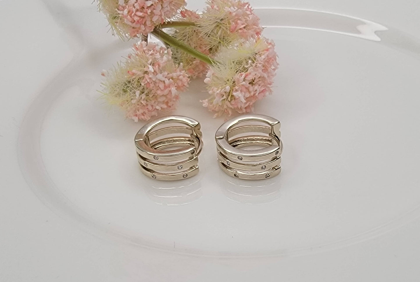 THREE LAYRED WITH RHINESTONE EAR CLICKER EARRINGS.