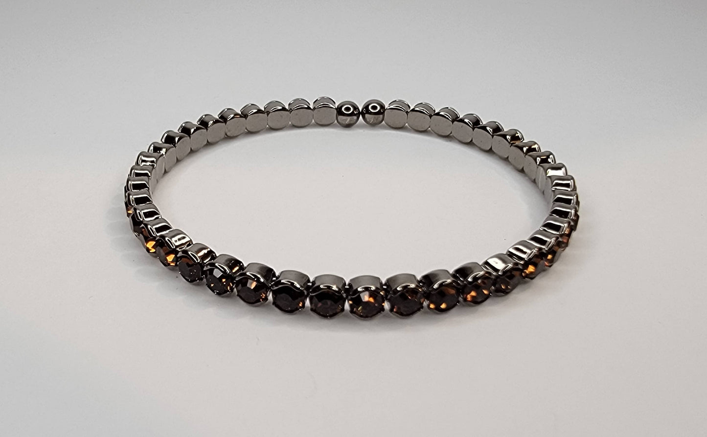 RHINESTONE STACKABLE DARK METAL BRACELET.