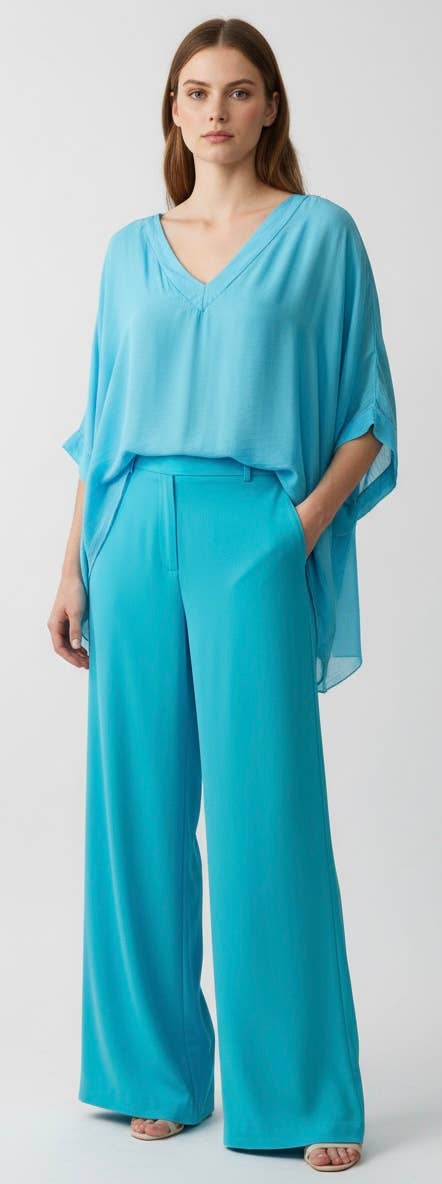 Silk Vneck Ruffle Top
No Tariffs Will Be Added