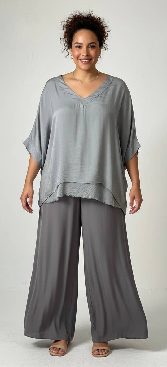 Silk Vneck Ruffle Top
No Tariffs Will Be Added