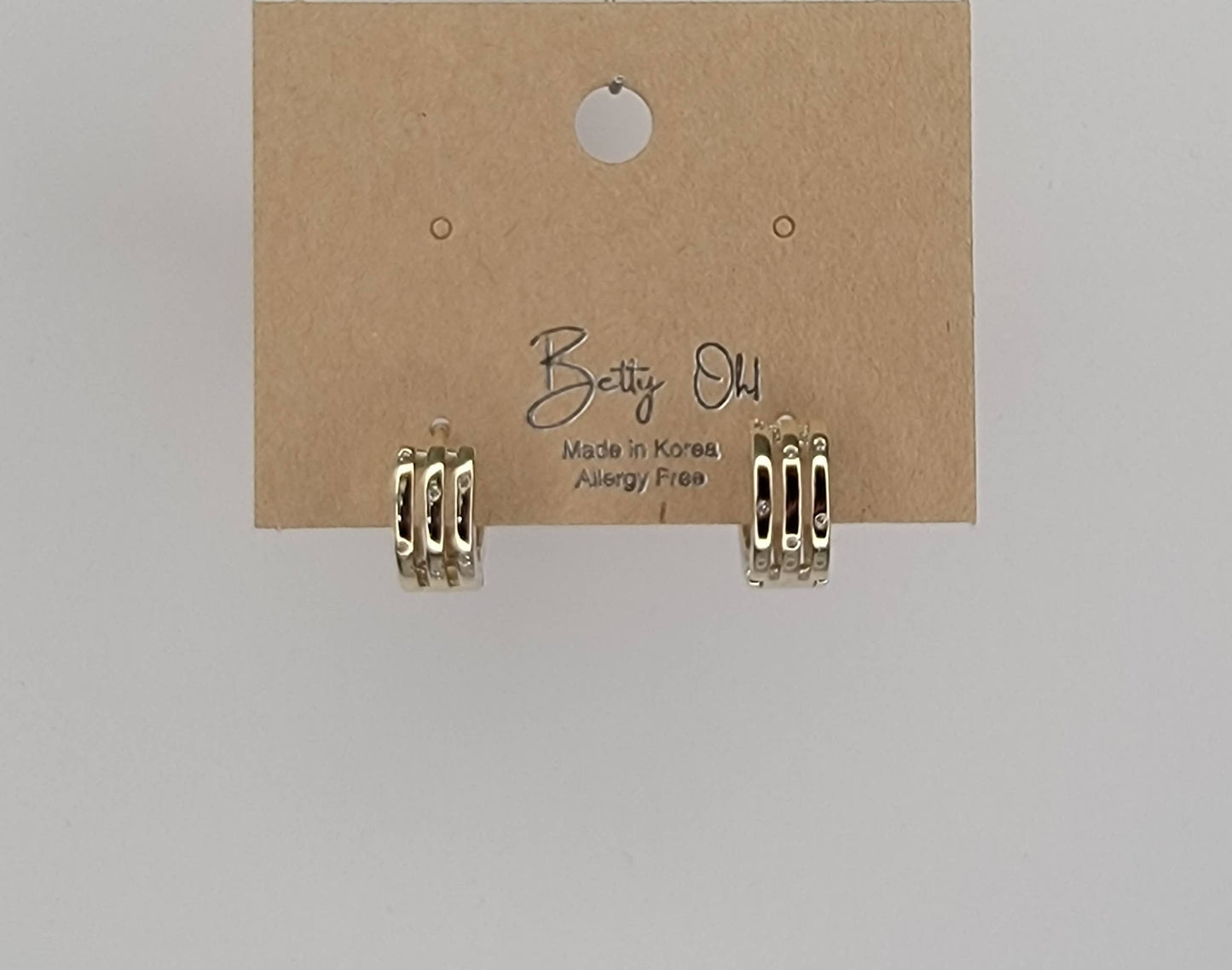 THREE LAYRED WITH RHINESTONE EAR CLICKER EARRINGS.