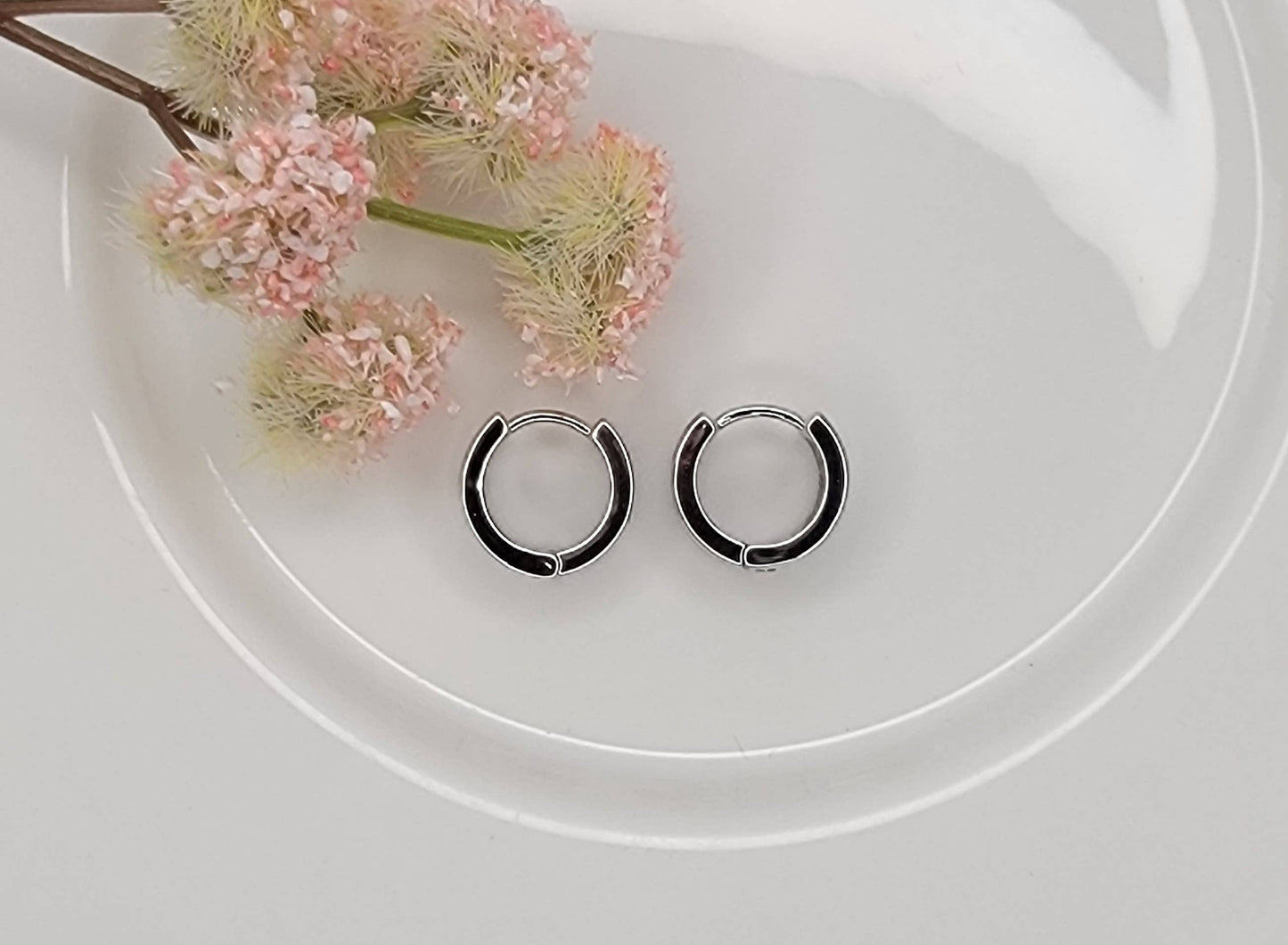 THREE LAYRED WITH RHINESTONE EAR CLICKER EARRINGS.