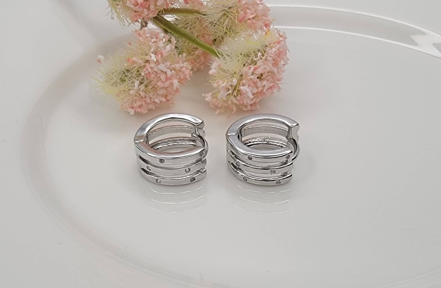 THREE LAYRED WITH RHINESTONE EAR CLICKER EARRINGS.