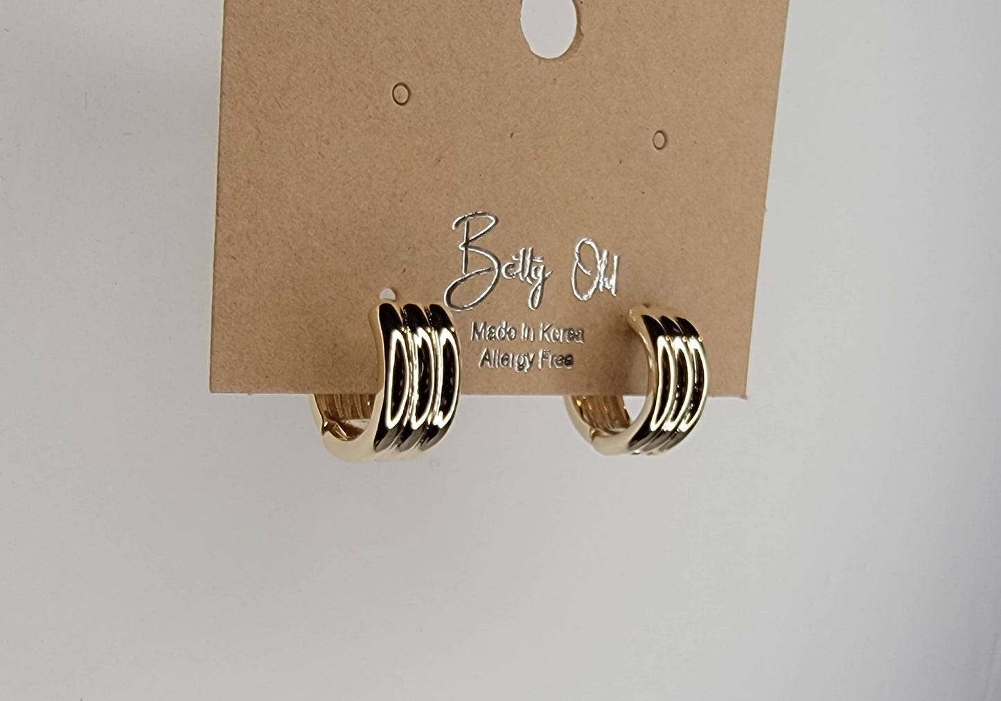 TRIPLE LAYERED CLICKER EARRINGS.