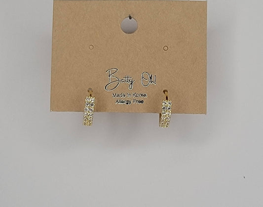 CZ CLICKER EARRINGS.