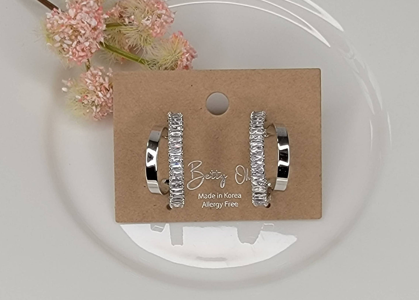 DOUBLE HOOP EARRINGS.