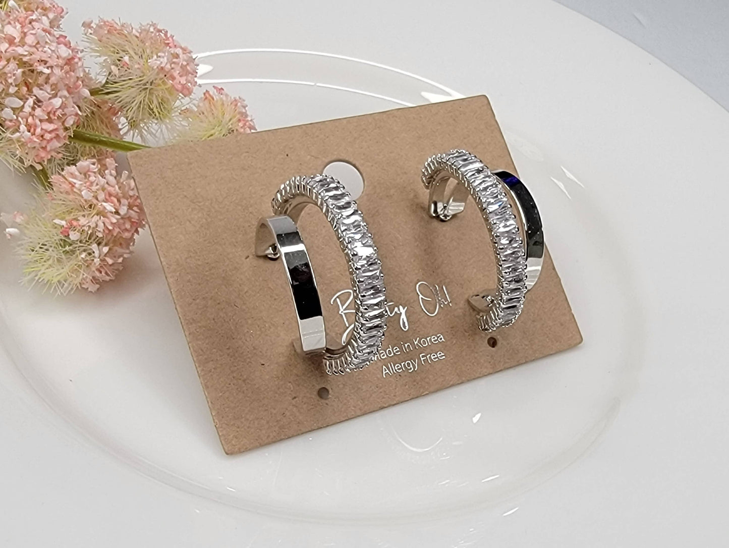 DOUBLE HOOP EARRINGS.